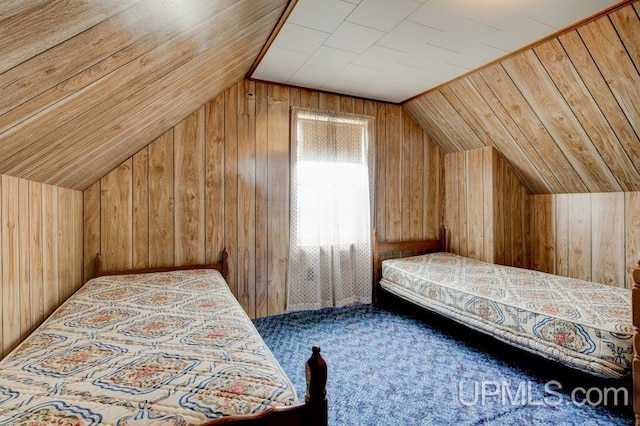 1782 H Rd, Bark River, MI 49807 - bedroom with lofted ceiling, wood walls, and carpet
