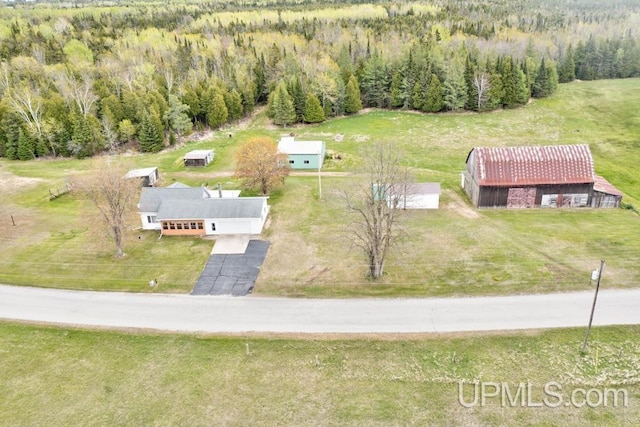 1782 H Rd, Bark River, MI 49807 - view from above of property with a heavily wooded area