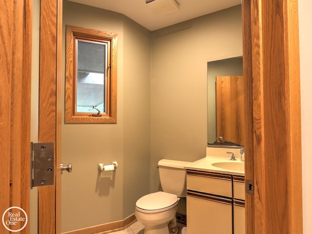 966 Pine Needle Trl, Oakland Twp, MI 48306 - bathroom featuring toilet, vanity, tile patterned floors, and baseboards