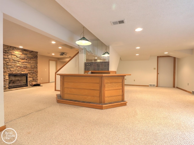 966 Pine Needle Trl, Oakland Twp, MI 48306 - indoor dry bar featuring carpet floors, baseboards, recessed lighting, a fireplace, and pendant lighting