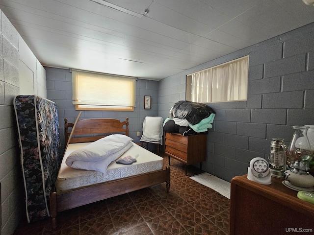 10162 Wyoming Rd, Mohawk, MI 49918 - bedroom featuring concrete block wall