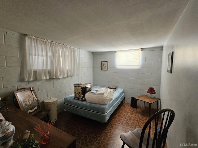 10162 Wyoming Rd, Mohawk, MI 49918 - bedroom featuring concrete block wall