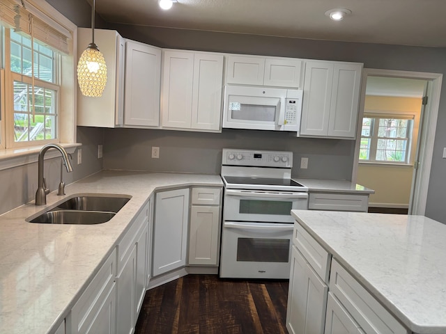 3214 Elnor Dr, Gladwin, MI 48624 - kitchen with white appliances, a sink, white cabinets, light stone counters, and recessed lighting