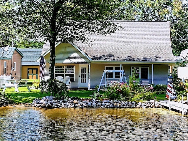 3214 Elnor Dr, Gladwin, MI 48624 - rear view of property with a water view