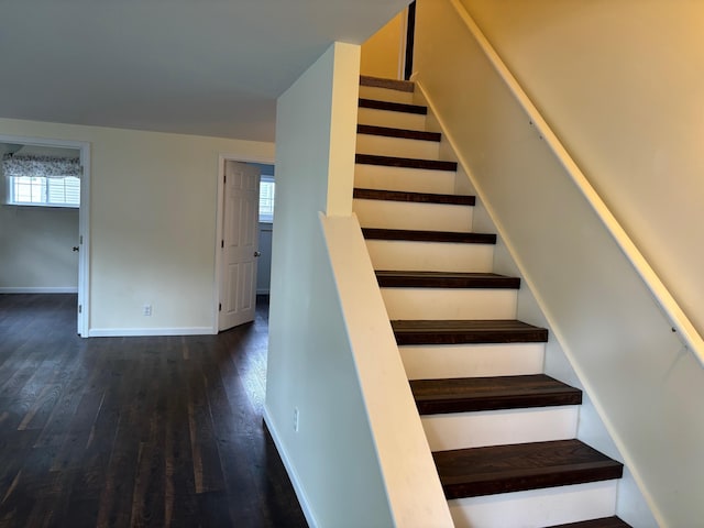3214 Elnor Dr, Gladwin, MI 48624 - staircase with wood-type flooring and baseboards