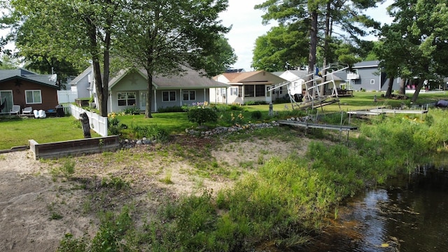 3214 Elnor Dr, Gladwin, MI 48624 - back of house featuring a water view