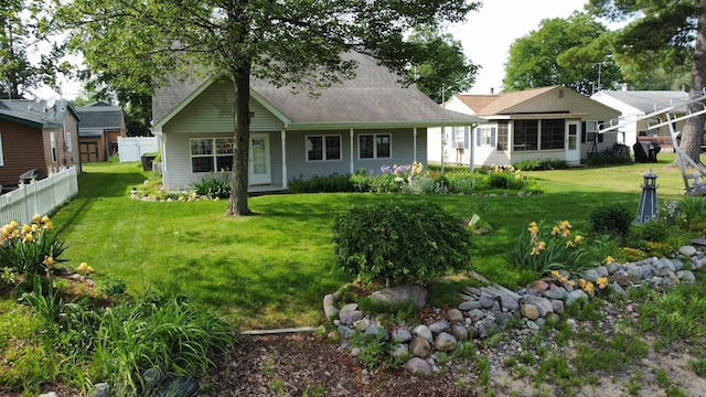 3214 Elnor Dr, Gladwin, MI 48624 - rear view of house with roof with shingles