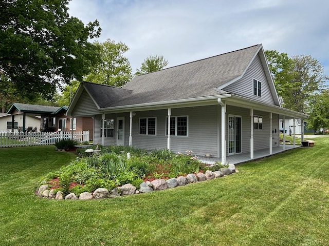 3214 Elnor Dr, Gladwin, MI 48624 - rear view of house with roof with shingles