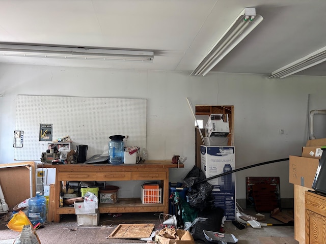 3214 Elnor Dr, Gladwin, MI 48624 - garage featuring a workshop area