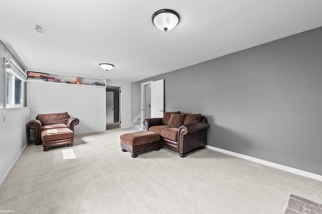 8912 Hubbard St, Livonia, MI 48150 - living room with light carpet, baseboards, and stairway