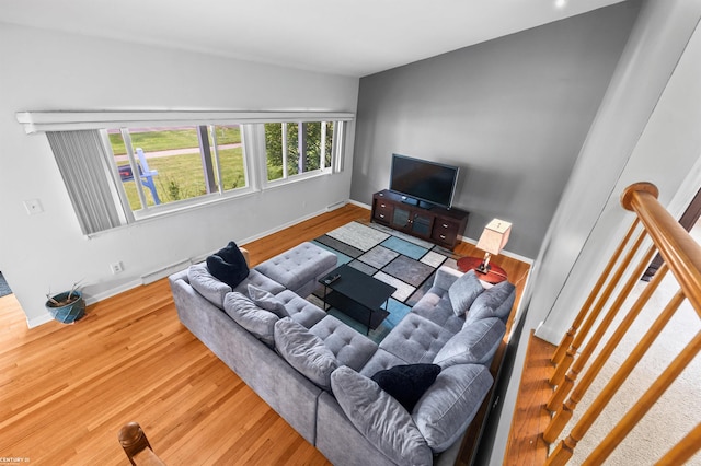 8912 Hubbard St, Livonia, MI 48150 - living area featuring wood finished floors and baseboards
