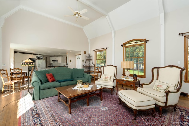 7975 00.25 Rd, Garden, MI 49835 - living room featuring hardwood / wood-style floors, a ceiling fan, and high vaulted ceiling