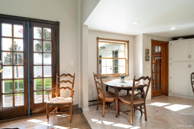 7975 00.25 Rd, Garden, MI 49835 - dining room featuring french doors, baseboards, recessed lighting, and light tile patterned floors