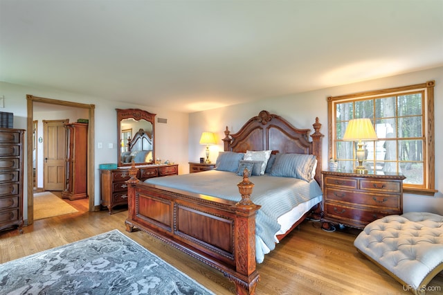 7975 00.25 Rd, Garden, MI 49835 - bedroom with light wood finished floors