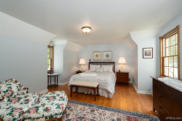 7975 00.25 Rd, Garden, MI 49835 - bedroom featuring light wood-type flooring and baseboards