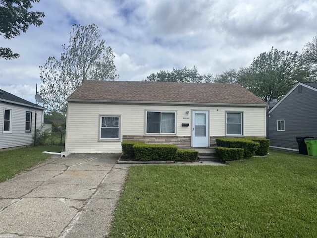 25230 Lehner St, Roseville, MI 48066 - view of front facade featuring a front lawn and stone siding
