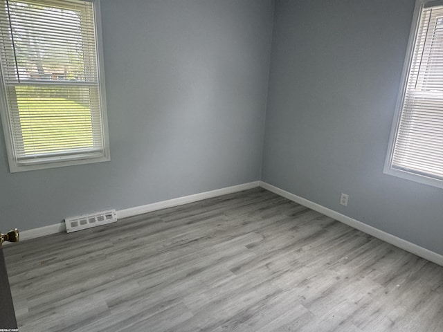 25230 Lehner St, Roseville, MI 48066 - spare room featuring baseboards and wood finished floors