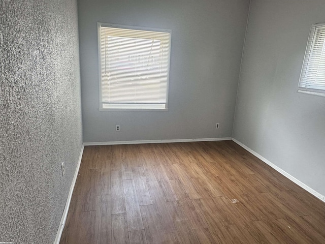25230 Lehner St, Roseville, MI 48066 - unfurnished room with wood finished floors and baseboards