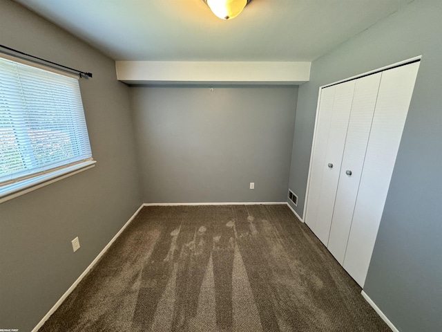 19299 Georgia St, Roseville, MI 48066 - unfurnished bedroom with a closet, carpet flooring, and baseboards