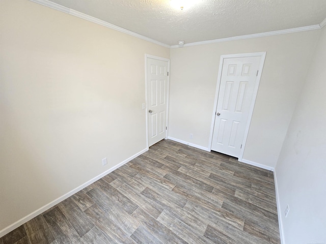 32782 N Susan Ln, New Haven, MI 48048 - unfurnished room with wood finished floors, crown molding, baseboards, and a textured ceiling