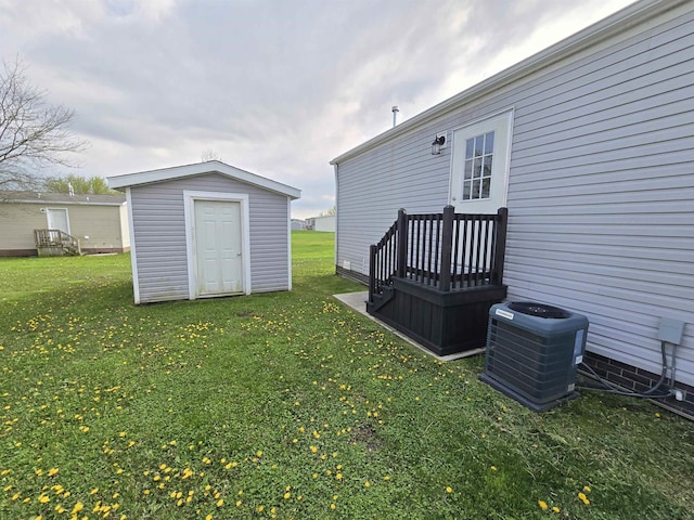 32782 N Susan Ln, New Haven, MI 48048 - view of green lawn featuring central AC unit