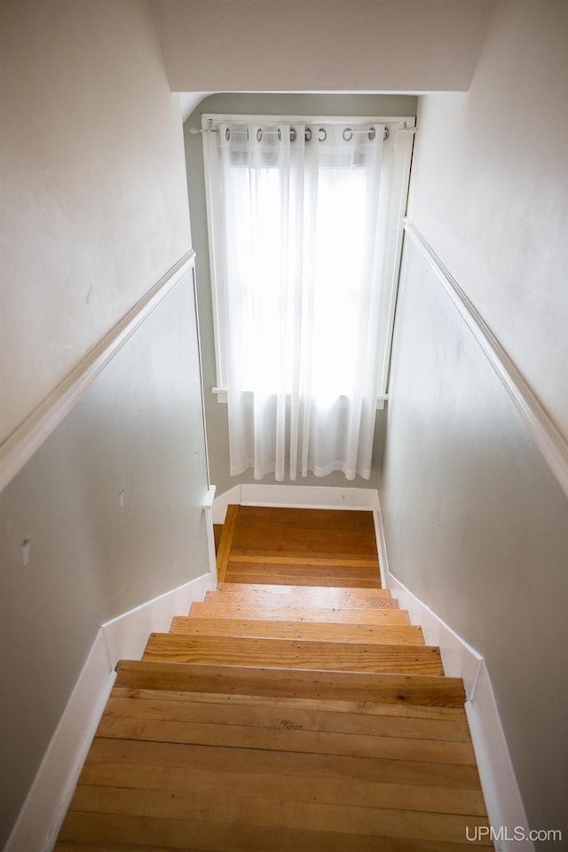 1302 N 3rd St, Ishpeming, MI 49849 - stairs featuring wood finished floors
