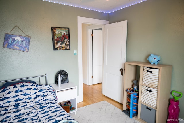1302 N 3rd St, Ishpeming, MI 49849 - bedroom featuring light wood finished floors