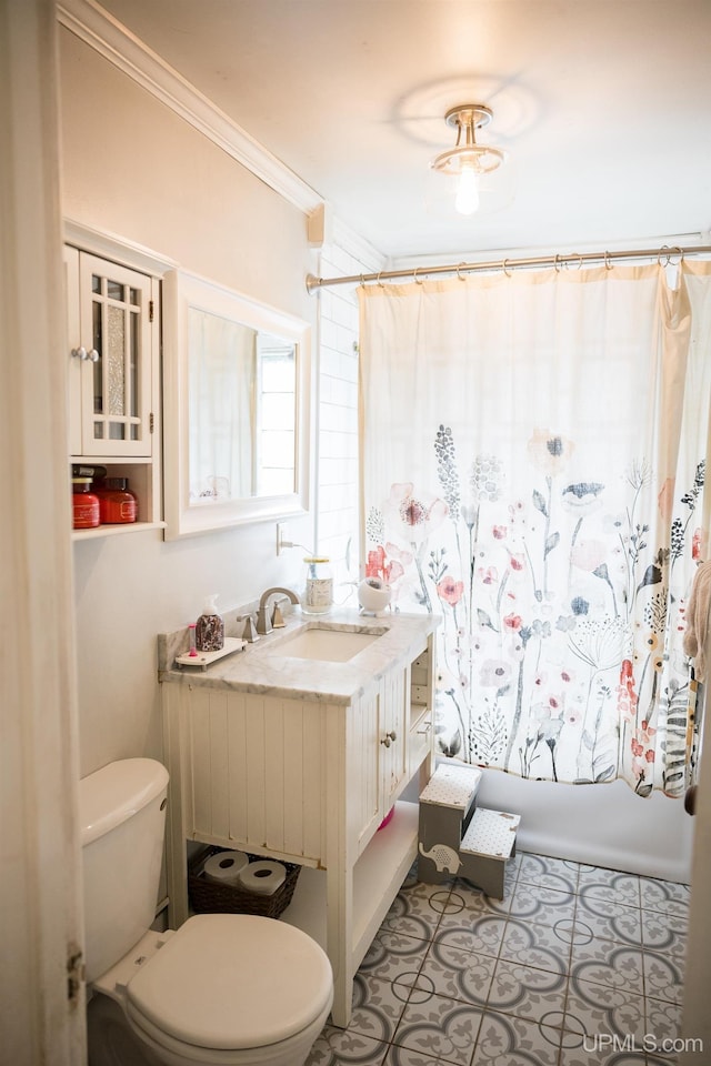 1302 N 3rd St, Ishpeming, MI 49849 - bathroom with toilet, vanity, shower / bath combination with curtain, and ornamental molding