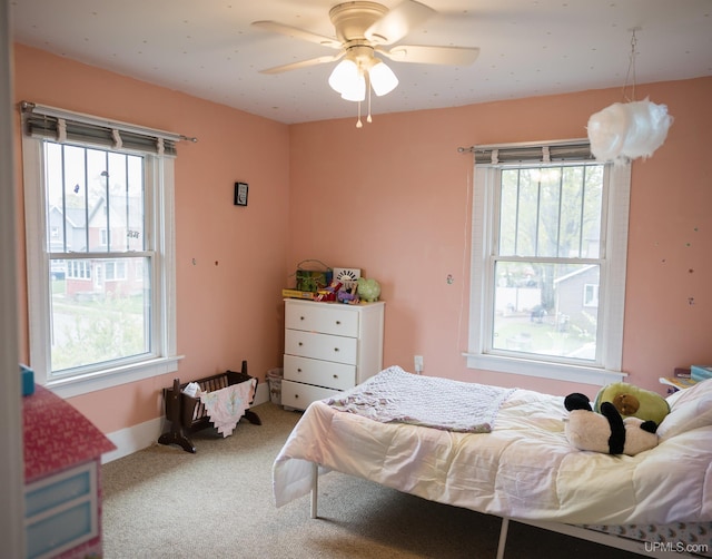 1302 N 3rd St, Ishpeming, MI 49849 - carpeted bedroom with ceiling fan