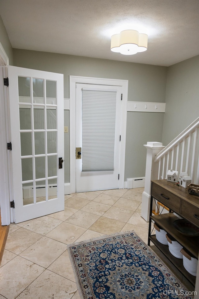 1302 N 3rd St, Ishpeming, MI 49849 - foyer featuring light tile patterned floors