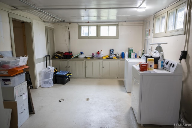 1302 N 3rd St, Ishpeming, MI 49849 - laundry area with washing machine and clothes dryer and cabinet space