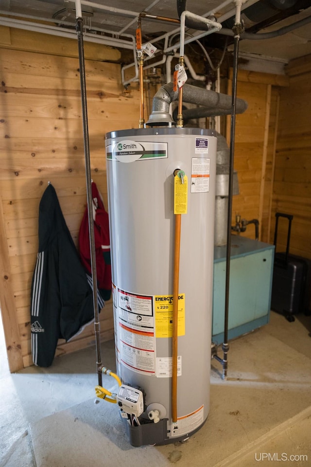 1302 N 3rd St, Ishpeming, MI 49849 - utility room featuring gas water heater