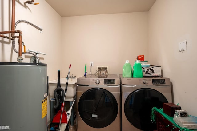 45537 Hidden View Ct, Utica, MI 48315 - laundry room featuring water heater and separate washer and dryer