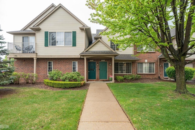45537 Hidden View Ct, Utica, MI 48315 - view of front of home with brick siding and a front yard
