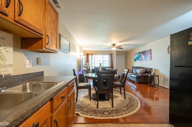 45537 Hidden View Ct, Utica, MI 48315 - dining room featuring wood finished floors and ceiling fan