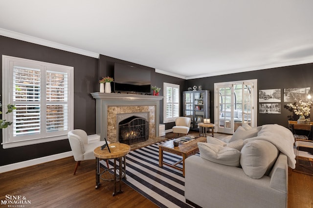 1435 Kensington Ave, Grosse Pointe Park, MI 48230 - living room featuring wood finished floors, a fireplace, crown molding, and baseboards