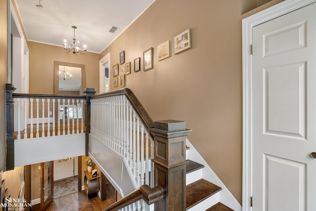 1435 Kensington Ave, Grosse Pointe Park, MI 48230 - stairway with a chandelier and ornamental molding