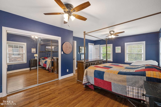 1435 Kensington Ave, Grosse Pointe Park, MI 48230 - bedroom with wood finished floors, baseboards, and a ceiling fan