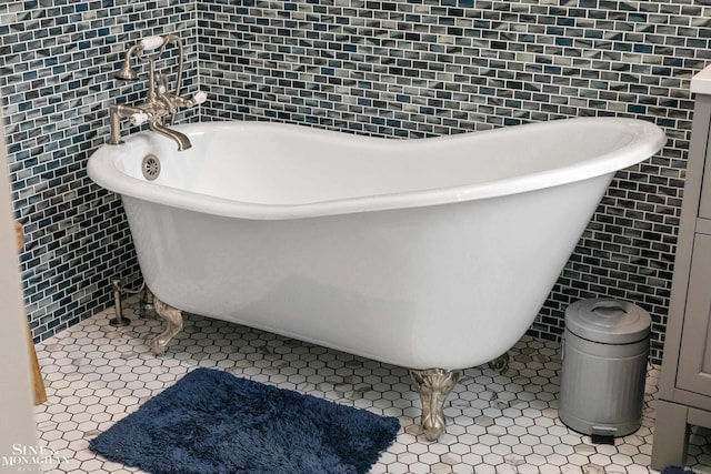 1435 Kensington Ave, Grosse Pointe Park, MI 48230 - bathroom featuring tile walls, a soaking tub, and tile patterned floors