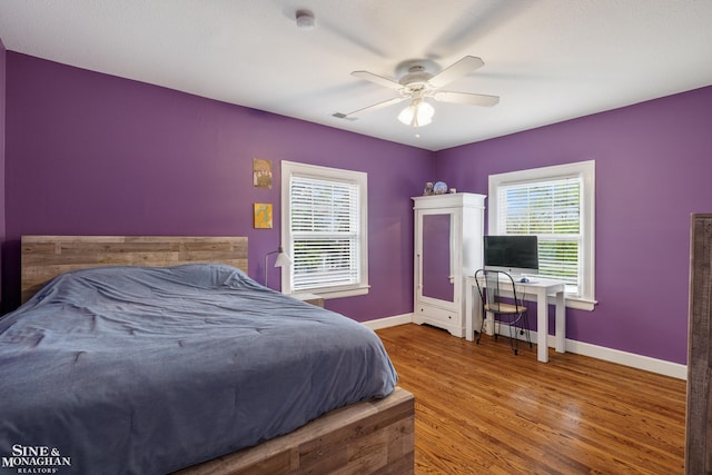 1435 Kensington Ave, Grosse Pointe Park, MI 48230 - bedroom with baseboards, wood finished floors, and ceiling fan