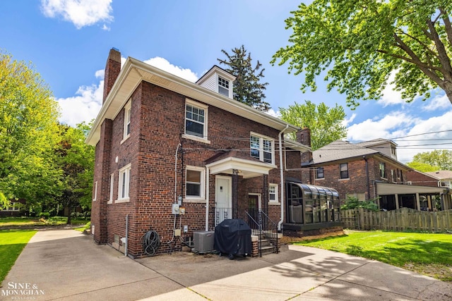 1435 Kensington Ave, Grosse Pointe Park, MI 48230 - view of front of home featuring brick siding and a chimney