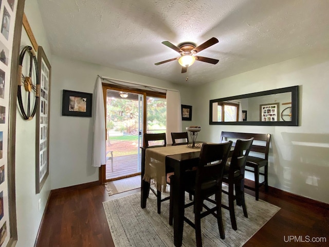 101-103 Juliet St, Marquette, MI 49855 - dining space with baseboards, ceiling fan, wood finished floors, and a textured ceiling