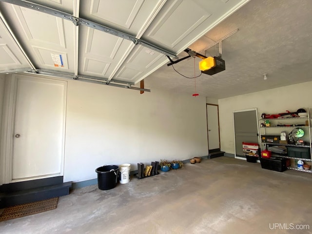 101-103 Juliet St, Marquette, MI 49855 - garage featuring a garage door opener