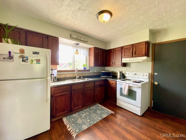 101-103 Juliet St, Marquette, MI 49855 - kitchen with white appliances, a sink, under cabinet range hood, dark wood-style flooring, and a textured ceiling