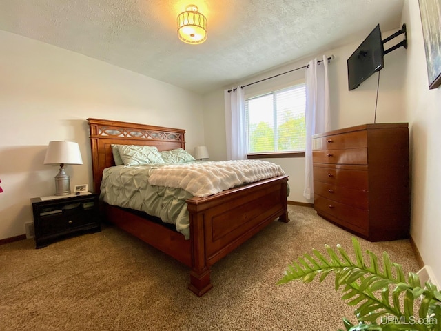 101-103 Juliet St, Marquette, MI 49855 - bedroom with light colored carpet, a textured ceiling, and baseboards