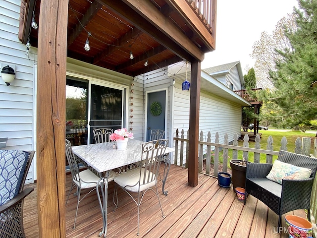 101-103 Juliet St, Marquette, MI 49855 - wooden terrace with outdoor dining area