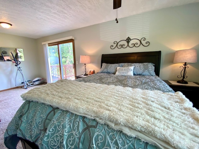 101-103 Juliet St, Marquette, MI 49855 - bedroom featuring carpet flooring, access to outside, baseboards, a textured ceiling, and ceiling fan