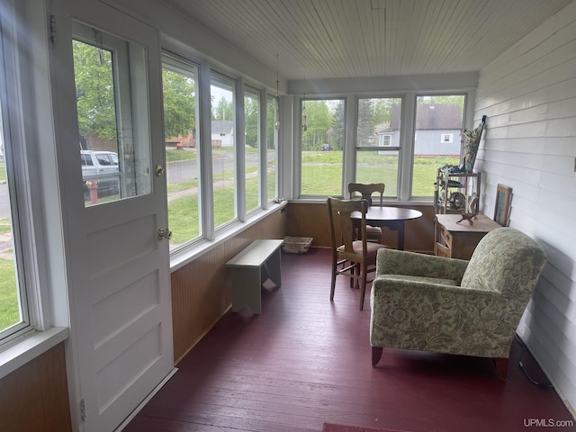 513 Neidhold Ave, Wakefield, MI 49968 - sunroom featuring hardwood / wood-style flooring, wood walls, and wooden ceiling
