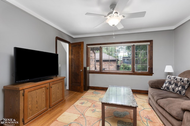 1264 Bedford Rd, Grosse Pointe Park, MI 48230 - living room with a ceiling fan, light wood-style floors, and baseboards