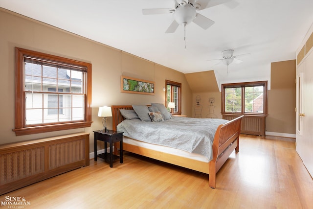 1264 Bedford Rd, Grosse Pointe Park, MI 48230 - bedroom with radiator, light wood finished floors, lofted ceiling, baseboards, and ceiling fan